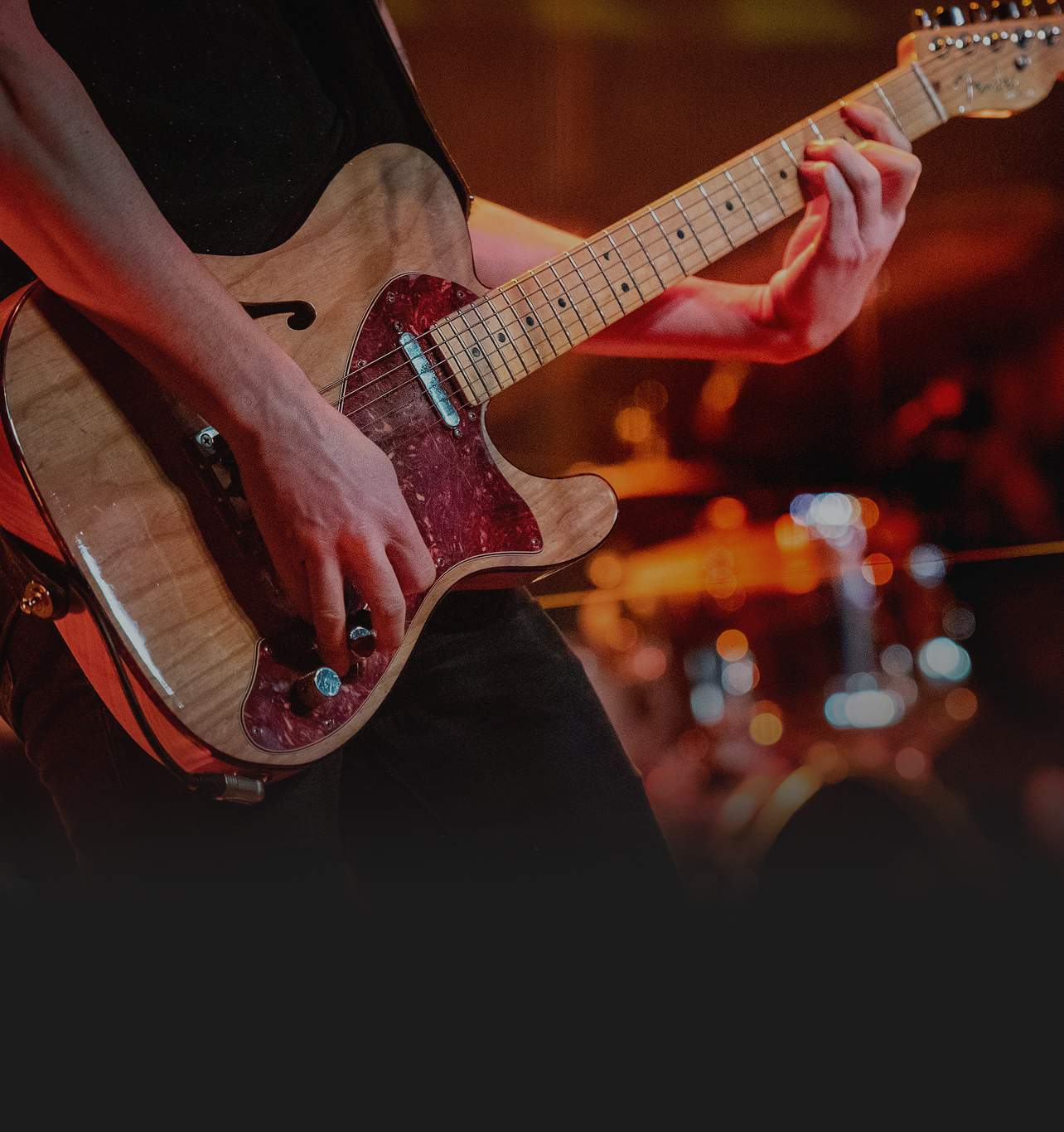 musician playing guitar